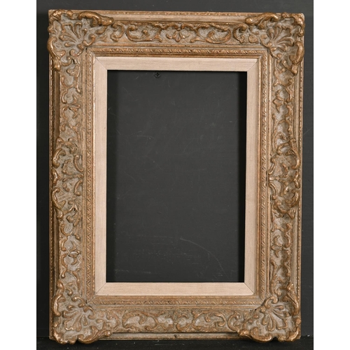 571 - 20th Century English School. A Painted Composition Frame, with swept centres and corners, with a fab... 