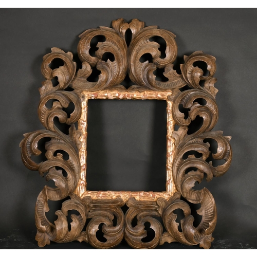 576 - 20th Century Italian School. An Elaborate Carved Wood Frame, with a gilt slip, rebate 10.5” x 9.25” ... 