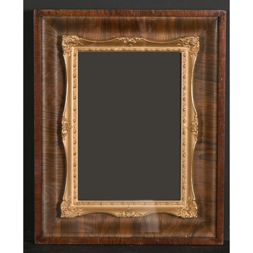 578 - 19th Century English School. A Gilt Composition Frame, with swept centres and corners, inside a glaz... 