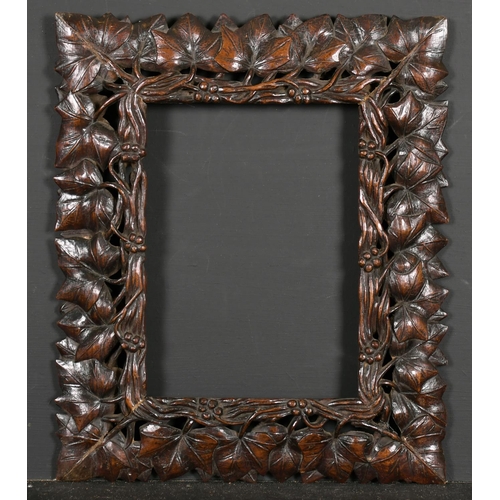 587 - 19th Century German School. A Carved Darkwood Leaf Design Frame, rebate 8.5” x 6.25” (21.7 x 15.8cm)