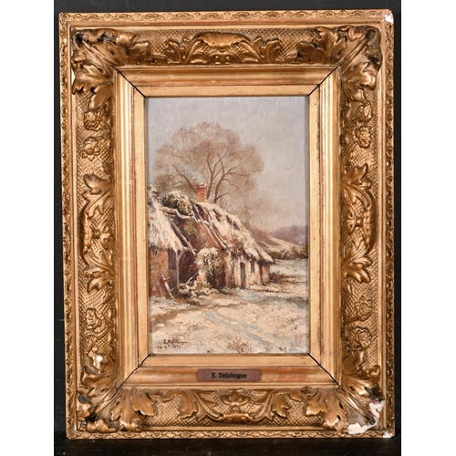 227 - Eugene Jules Delahogue (1867-1934) French. A Snow-Covered Cottage in a Landscape, Oil on Panel, Sign... 