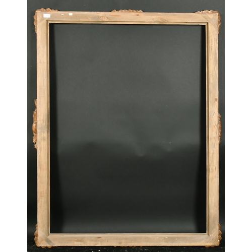 410 - Late 20th Century European School. A Carved Giltwood Swept Frame with central motif (horizontal), re... 