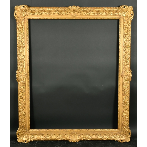 415 - Alexander G Ley & Son. A Reproduction Carved Giltwood Frame, with swept centres and corners, rebate ... 