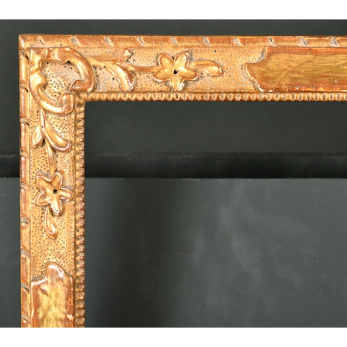 512 - Alexander G Ley & Son. A Reproduction Carved Giltwood Venetian Panel Frame, rebate 20