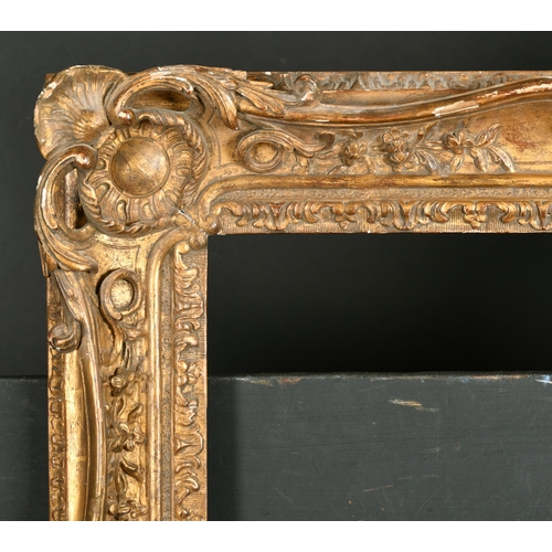 513 - 19th Century French School. A Carved Giltwood Frame, with swept and pierced centres and corners, reb... 