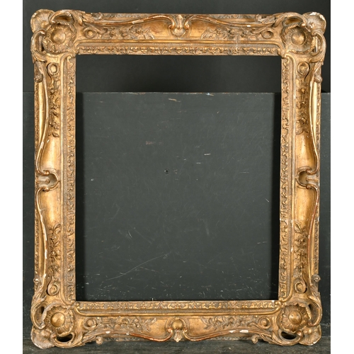 513 - 19th Century French School. A Carved Giltwood Frame, with swept and pierced centres and corners, reb... 