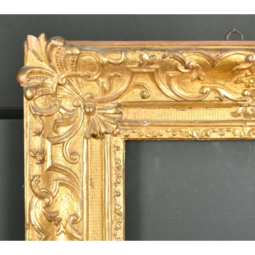 523 - Early 18th Century Italian School. A Venetian Carved Giltwood Swept Frame, rebate 14