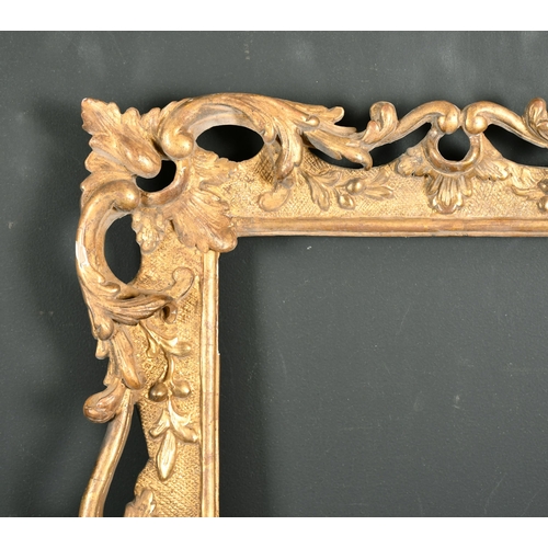 526 - 18th Century English School. A Fine Chippendale Carved Giltwood Swept Frame, rebate 12.5