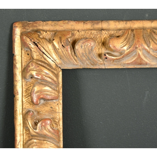 530 - 17th Century Italian School. A Carved Giltwood Leaf Frame, rebate 8.5