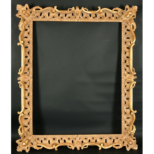 462 - 20th Century English School. A Carved Giltwood Frame, with swept and pierced centres and corners, re... 