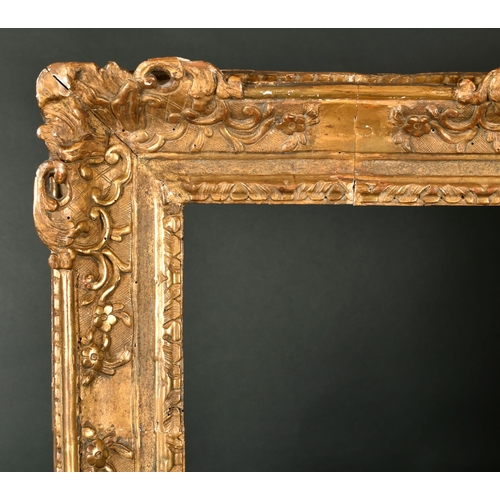 472 - 18th Century French School. A Carved Giltwood Louis Frame, with swept and pierced centres and corner... 