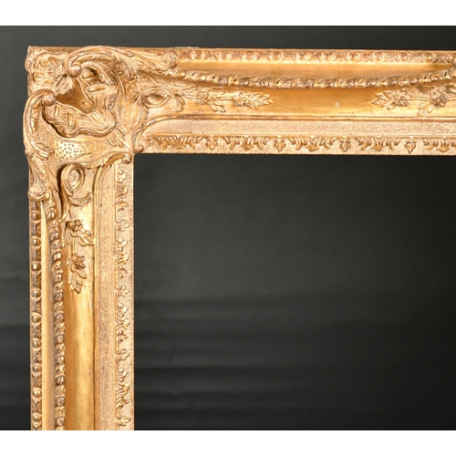 286 - John Davies Framing. A Reproduction Carved Giltwood Louis XV Style Frame, with swept centres and cor... 