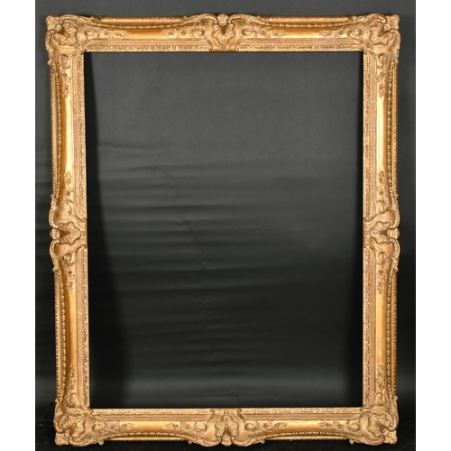 286 - John Davies Framing. A Reproduction Carved Giltwood Louis XV Style Frame, with swept centres and cor... 