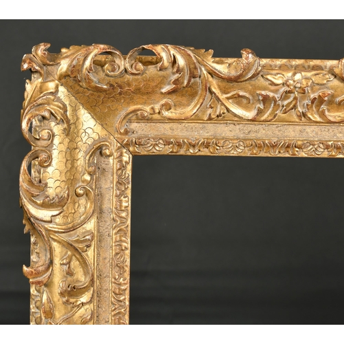 295 - John Davies Framing. A Reproduction Carved Giltwood Hugenot Louis XIV Style Frame, with swept and pi... 