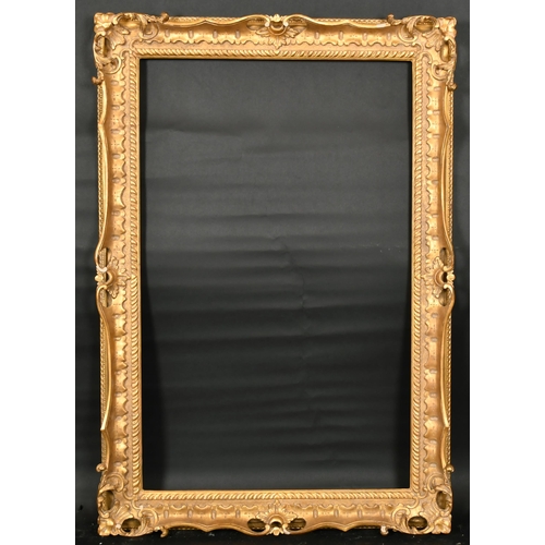 300 - John Davies Framing. A Reproduction Carved Giltwood Chippendale Style Frame, with swept and pierced ... 