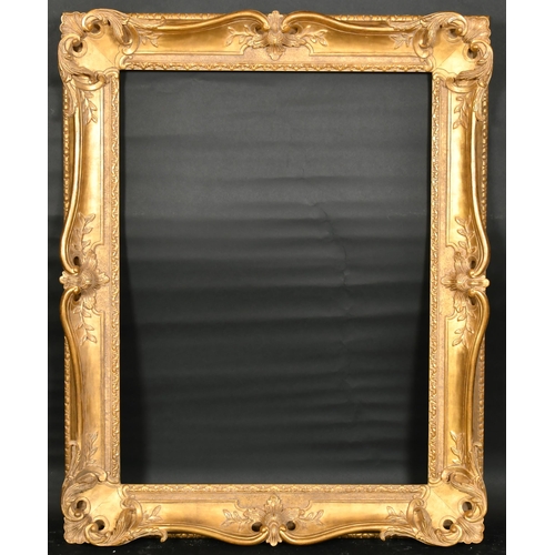 322 - John Davies Framing. A Reproduction Carved Giltwood Louis XV Style Frame, with swept and pierced cen... 