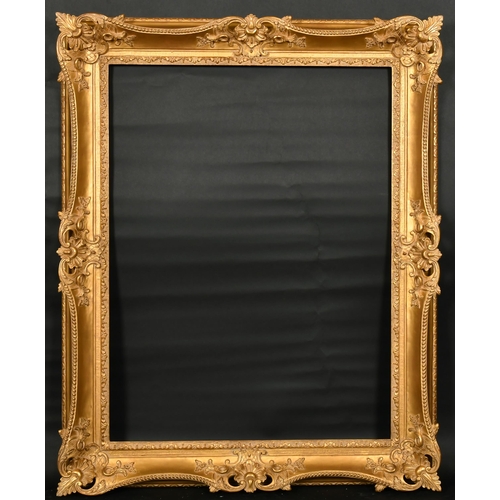 324 - John Davies Framing. A Reproduction Carved Giltwood Louis XV Style Frame, with swept and pierced cen... 