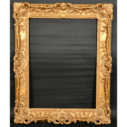 325 - Early 20th Century French School. A Carved Giltwood Louis XV Style Frame, with swept and pierced cen... 