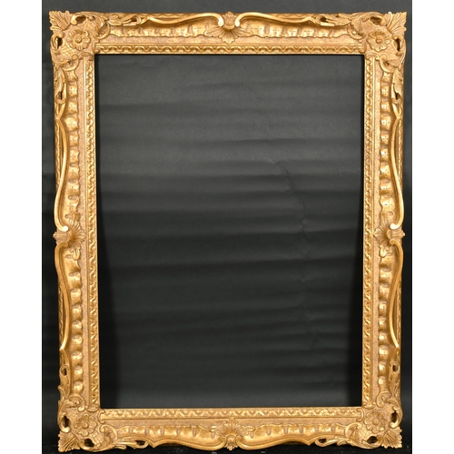 326 - John Davies Framing. A Reproduction Carved Giltwood Chippendale Style Frame, with swept centres and ... 