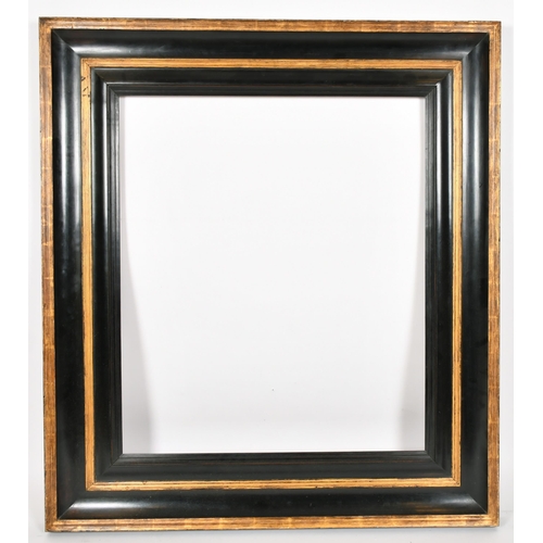 334 - John Davies Framing. A Reproduction Black and Gilt Reverse Ogee Scotia Frame, rebate 30