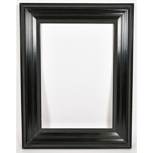 337 - John Davies Framing. A Reproduction Darkwood Forward Weenix Frame, rebate 30