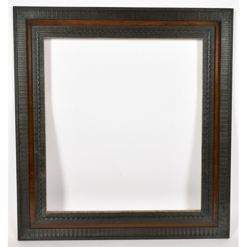 346 - John Davies Framing. A Reproduction Darkwood Reverse Ripple Frame, rebate 28.5