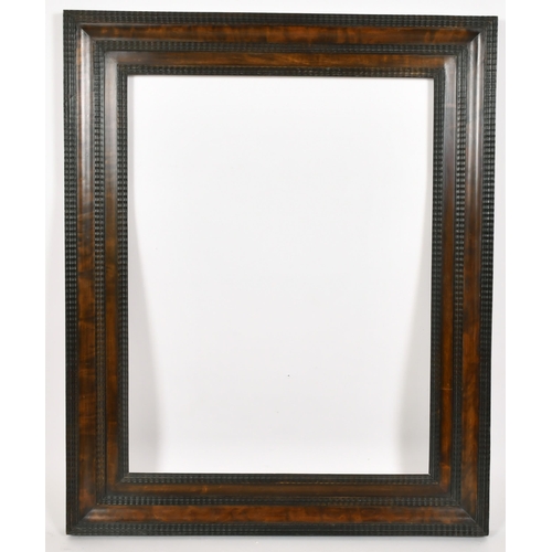 349 - John Davies Framing. A Reproduction Darkwood Flat Forward Ogee Frame, rebate 27.25