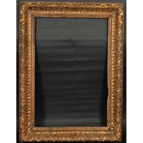 351 - 18th Century Italian School. A Carved Giltwood Leaf Ogee Frame, rebate 27