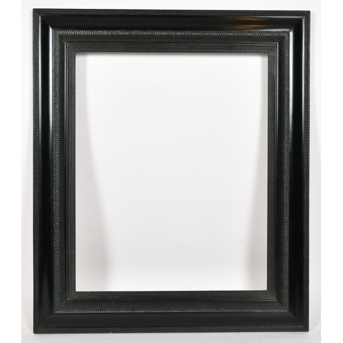 366 - John Davies Framing. A Reproduction Darkwood Frame, rebate 24.75