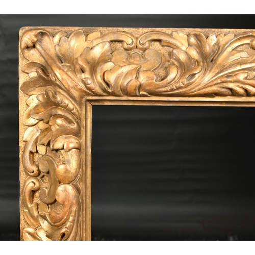 370 - 18th Century Italian School. A Carved Giltwood Reverse Leaf Frame, rebate 24