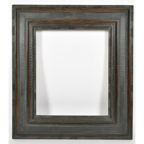 378 - John Davies Framing. A Reproduction Darkwood Reverse Ripple Frame, rebate 23