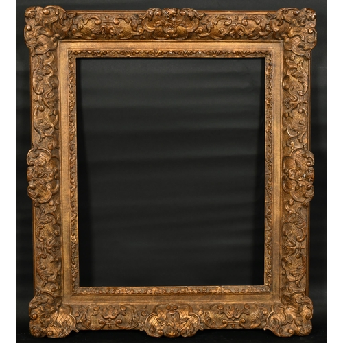 383 - John Davies Framing. A Reproduction Carved Giltwood Louis XIV Style Frame, with swept centres and co... 