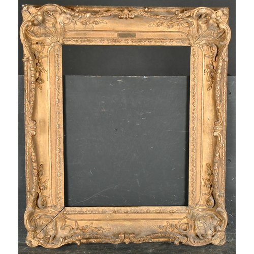 397 - Early 18th Century French School. A Louis XIV Carved Giltwood Frame, with swept corners, rebate 19