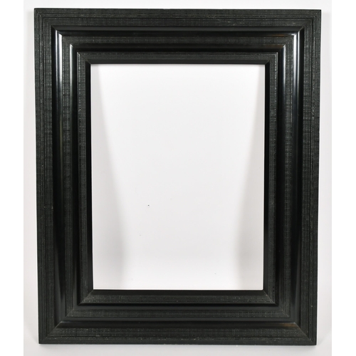 398 - John Davies Framing. A Reproduction Darkwood Combination Profile Frame, rebate 19