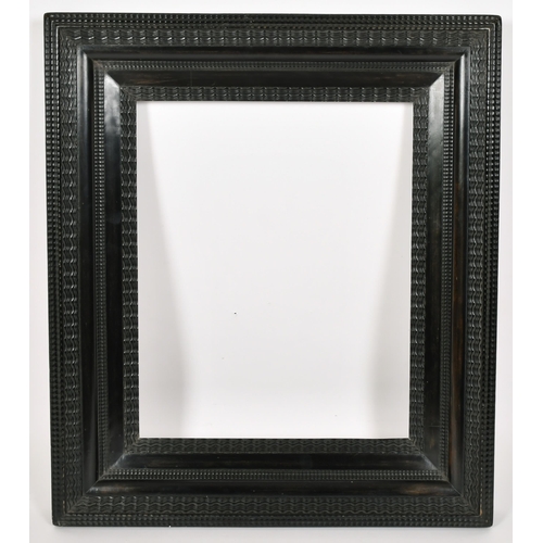 399 - John Davies Framing. A Reproduction Darkwood Ripple Frame, rebate 18.75