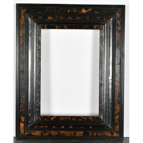 412 - 20th Century English School. A Darkwood and Simulated Tortoiseshell Reverse Frame, rebate 12.5