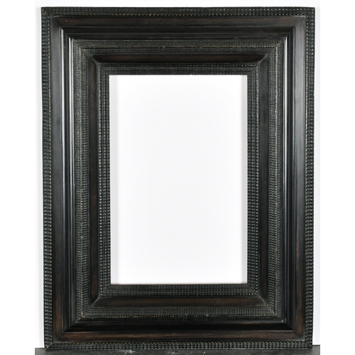 416 - John Davies Framing. A Reproduction Darkwood Reverse Ripple Frame, rebate 11