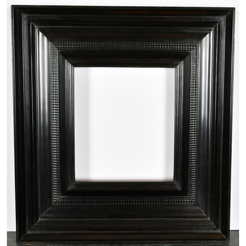 418 - John Davies Framing. A Reproduction Darkwood Weenix Ripple Frame, rebate 8.5