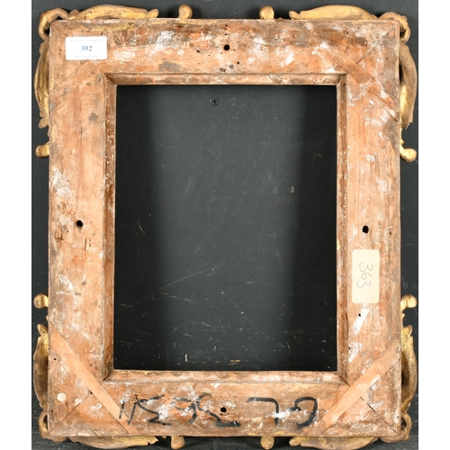 392 - 18th Century French School. A Fine Carved Giltwood Frame, with swept and pierced corners, rebate 11