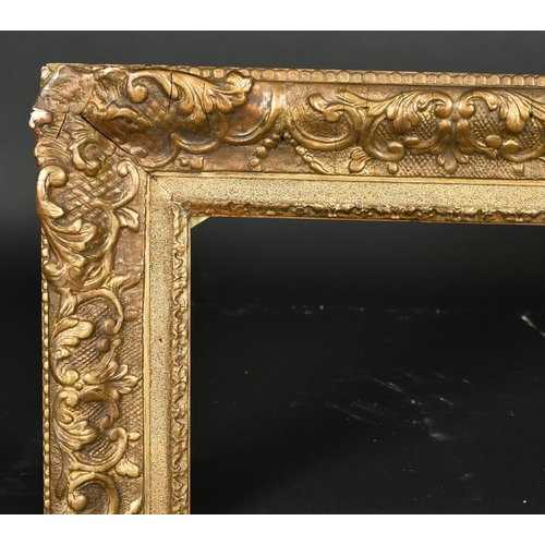 318 - 19th Century French School. A Louis Style Gilt Composition Frame, with swept centres and corners, re... 