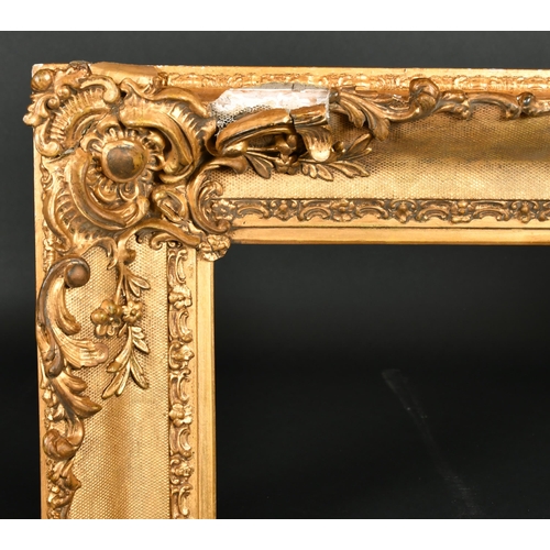 319 - 19th Century English School. A Gilt Composition Frame, with swept centres and corners, rebate 36