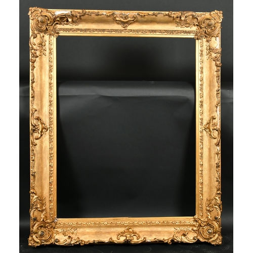 319 - 19th Century English School. A Gilt Composition Frame, with swept centres and corners, rebate 36