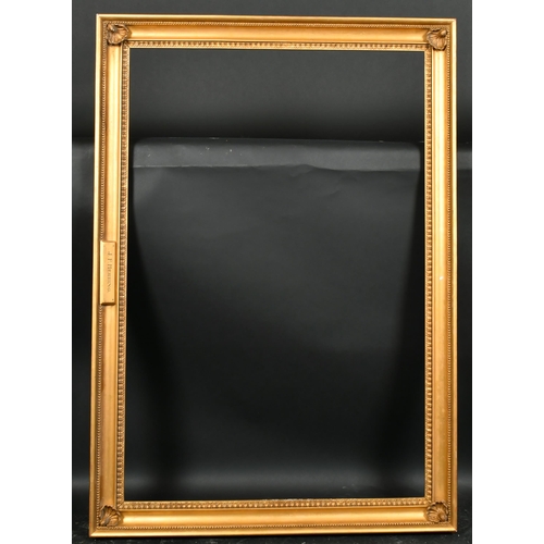 322 - 20th Century English School. A Gilt Composition Hollow Frame, with corner rosettes, rebate 36