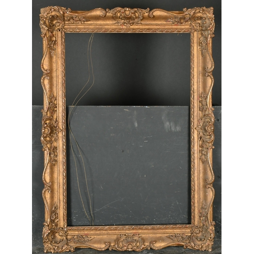 356 - 20th Century English School. A Gilt Composition Frame, with swept centres and corners, rebate 26