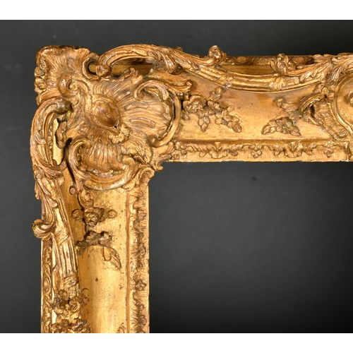 377 - 19th Century French School. A Fine Carved Giltwood Frame, with swept centres and corners, rebate 23.... 