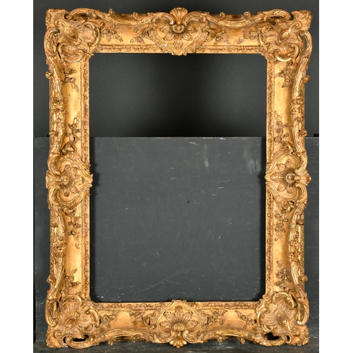 377 - 19th Century French School. A Fine Carved Giltwood Frame, with swept centres and corners, rebate 23.... 