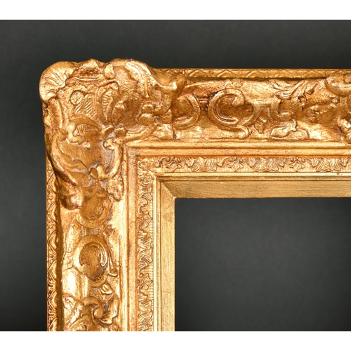 387 - 21st Century English School. A Gilt Composition Frame, with swept centres and corners, rebate 20.75