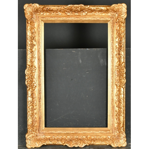 387 - 21st Century English School. A Gilt Composition Frame, with swept centres and corners, rebate 20.75