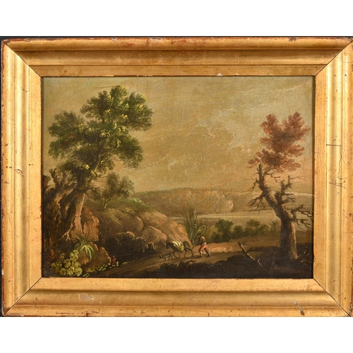 27 - 19th Century European School. A Figure with a Donkey on a Path, Oil on canvas, Inscribed on a label ... 