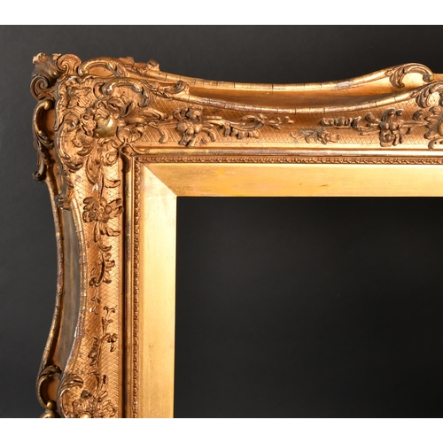 294 - 19th Century English School. A Gilt Composition Frame, with swept centres and corners, rebate 50